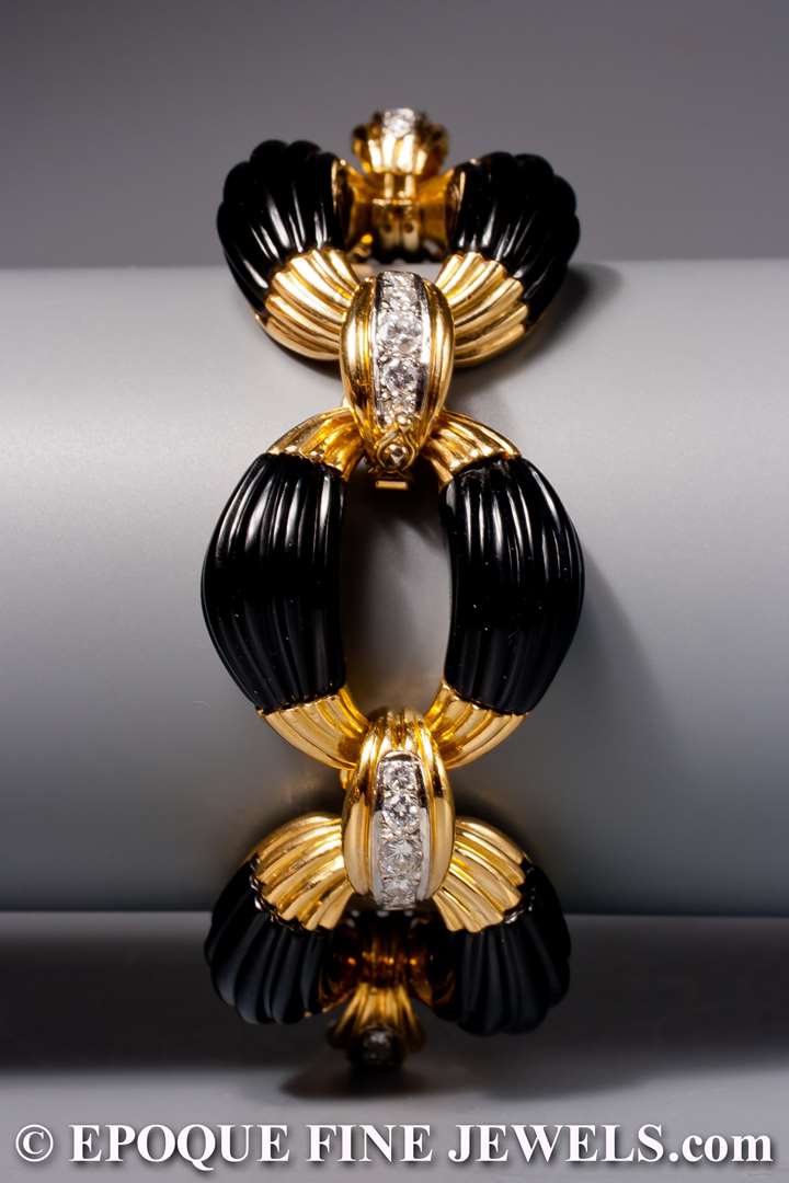 A very stylish onyx and diamond bracelet, retailed by Neiman Marcus,